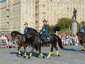 The cavalry honorary escort of the Presidential Regiment speaks against the background of the monument to the heroes of the First