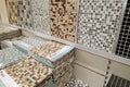 Moscow, Russia - August 17, 2019: Decorative mosaic ceramic tiles on the rack in a building materials store