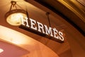 MOSCOW, RUSSIA - AUGUST 10, 2021: Hermes brand retail shop logo singboard on the storefront in the shopping mall.