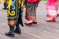 Moscow, Russia - August 02, 2019: Indonesian women wearing traditional clothes dancing together during national asian festival Royalty Free Stock Photo