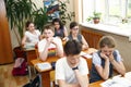 Moscow,Russia-August 16,2016-Little schoolboy sitting behind school desk during lesson in Russian school