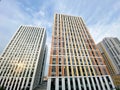 Moscow, Russia, August 2021: New multi-storey apartment block houses. Mortgage concept. Tall as skyscrapers. Blue sky. Copy space Royalty Free Stock Photo