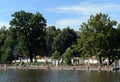 People rest on the beach in the natural-historical park `Kuzminki-Lublino`