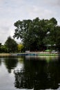 Moscow, Russia - August 21, 2019: Pond in the Gorky Park with boat rental station and a cafe in the background