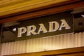 MOSCOW, RUSSIA - AUGUST 10, 2021: Prada brand retail shop logo signboard on the storefront in the shopping mall.