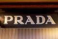 MOSCOW, RUSSIA - AUGUST 10, 2021: Prada brand retail shop logo signboard on the storefront in the shopping mall.
