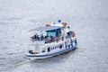 Rear view on the small pleasure craft with passengers, sailing on the Moscow river editorial