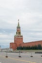 Moscow, Russia - August 24, 2020: Red Square, Spasskaya clock tower in the capital. Red brick wall and green fir trees. Festival