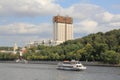 Moscow, Russia - August 07, 2019: River pleasure boat and Andreevskaya Embankment of Moscow River