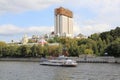 Moscow, Russia - August 07, 2019: River pleasure boat Moscow 88 and Andreevskaya Embankment of Moscow River