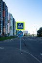 Moscow, Russia, August 07, 2020: Road signs of the pedestrian crossing and the end of the bike path. Royalty Free Stock Photo