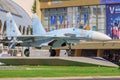 Moscow, Russia - August 01, 2018: Russian fighter SU-27 closeup on a background of pavilion Electrification on Exhibition of Achie