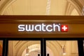 MOSCOW, RUSSIA - AUGUST 10, 2021: Swatch brand retail shop logo signboard on the storefront in the shopping mall