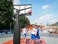 Moscow, Russia - August 4, 2018: Team playing basketball in the Gorky Park in summer. Basketball player throws the ball