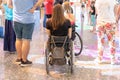 MOSCOW, RUSSIA - AUGUST 29, 2018: Two disabled persons in wheelchairs in the shopping mall