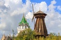 Moscow, Russia - August 06, 2018: Wooden windmill in Izmailovo Kremlin on a watchtower background in sunny summer morning. Cultura