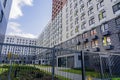 MOSCOW, RUSSIA - 04.10.2021: Buildings facades in housing complex Mitino Park, construction company Pik. Modern symmetry