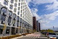 MOSCOW, RUSSIA - 04.10.2021: Buildings facades in housing complex Salarievo, construction company Pik. Modern symmetry