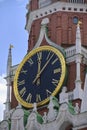 Moscow Russia 12.05.2023.Clock Spasskaya tower Kremlin is closeup against blue sky