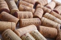 MOSCOW / RUSSIA - 14/05/2020 close up filled frame top view background wallpaper shot of a bunch of wooden wine corks on a white