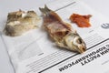 MOSCOW / RUSSIA - 24/05/2020 close up shot of a dressed dried salted vobla Caspian Roach fish, its separated head, caviar and