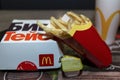 Moscow, Russia, 03/26/2020: Combo lunch from McDonald`s on a tray on the table. French fries, big tortie burger and drink. Close-
