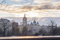 Moscow, Russia - 02.27.2019: Dawn over Moscow, temple, church, chapel, crosses and domes, Novospassky Stavropegic Monastery and