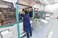 Moscow, Russia - Dec. 5.2019. Worker at the machine in Mikron - largest plant for production of chips. Zelenograd Royalty Free Stock Photo