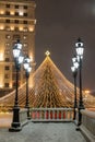 Moscow, Russia - December 7, 2022: Big Christmas tree. New Year decorations and Christmas atmosphere on a winter street in Moscow Royalty Free Stock Photo