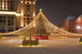 Moscow, Russia - December 7, 2022: Big Christmas tree. New Year decorations and Christmas atmosphere on a winter street in Moscow Royalty Free Stock Photo