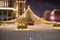 Moscow, Russia - December 7, 2022: Big Christmas tree. New Year decorations and Christmas atmosphere on a winter street in Moscow Royalty Free Stock Photo