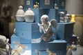 Christmas Gift Showcase with White Gypsum Angels and Vases at Gum, the State Department Store