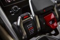 Moscow, russia - december 15, 2020: close-up of gearshift and mode controller in the premium sports luxury crossover lamborghini