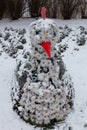 Moscow, Russia - December 02, 2021:decorative bird peacock in winter