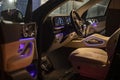 Moscow, Russia - December 24, 2019: Empty interior of light leather interior of premium SUV Mercedes GLS class night shooting.