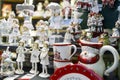 Ceramic Christmas toys: girls, princesses, squirrels, mugs and figurines for sale at the fair