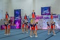 Moscow, Russia - December 22, 2019: Girls cheerleaders perform a stunt action trick, well-coordinated teamwork