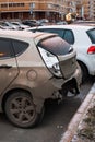 Moscow, Russia - December 29, 2019: Hyundai Solaris car after the accident, broken bumper vertical close-up. Broken Hyundai in the