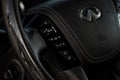 MOSCOW, RUSSIA - DECEMBER 11, 2021 Infiniti QX80 QX56 Multiple buttons on the steering wheel