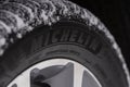 Moscow, Russia - December 18, 2021 Michelin tire logo on the sidewall of the new tire.