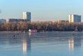 Moscow, Russia - december 4, 2020: People skate on the frozen Moscow Canal in Moscow, Russia. People on the frozen river