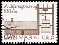Postage stamp printed in Denmark shows Dairy Farm at Hjedding & Butter Churn, Anniversaries and Events 1982 serie, circa 1982