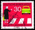 Postage stamp printed in Germany shows Give priority to pedestrians at the crosswalk, give hand signal, New Road Traffic