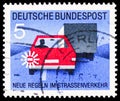 Postage stamp printed in Germany shows Operate the turn signal before overtaking, New Road Traffic Regulations 2nd series serie