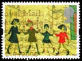 `Children Playing` L. S. Lowry, Greetings Stamps 1995 - Art serie, circa 1995 Royalty Free Stock Photo