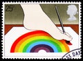 Postage stamp printed in United Kingdom shows Disabled Artist with Foot painting, International Year of the Disabled serie, circa