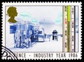 Postage stamp printed in United Kingdom shows Thermometer and Pharmaceutical Laboratory Health, Industry Year serie, circa 1986