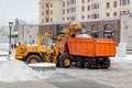 Moscow, Russia - December 15, 2021: Snow clearing. Tractor clears the way after heavy snowfall in the center of Moscow. Manezhnaya Royalty Free Stock Photo