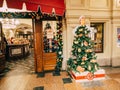 MOSCOW, Russia - December 19, 2018: Unusual fair Christmas trees In the form of Soviet woman seller of Deli number 1 in