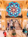 MOSCOW, Russia - December 19, 2018: Unusual fair Christmas trees In the form of Soviet woman seller of Deli number 1 in